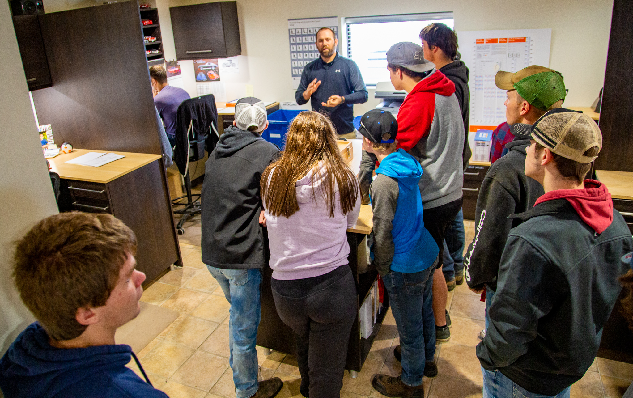 Jon Bultje, from Windmill Cabinet Shop, discussing the technology used to create the custom cabinetry and other furniture