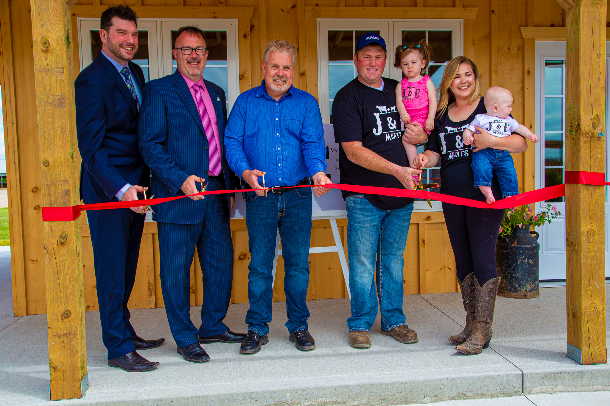 Cutting the ribbon at J&E Meats to celebrate the new location in Croton.