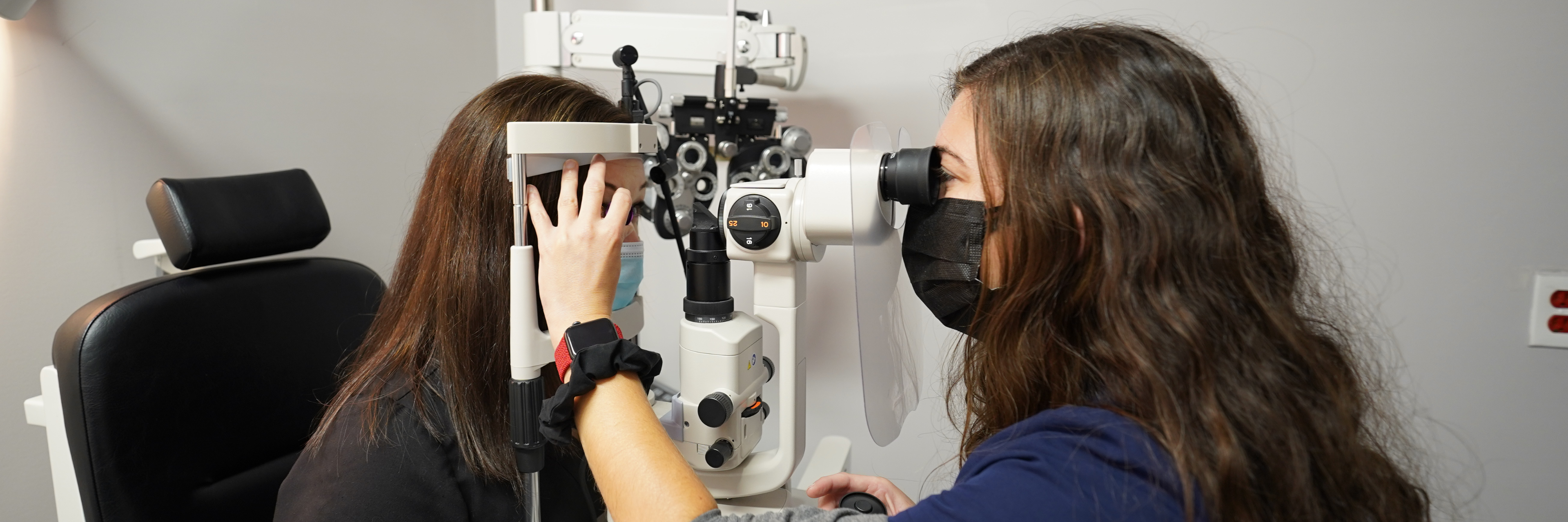 A resident getting an eye exam