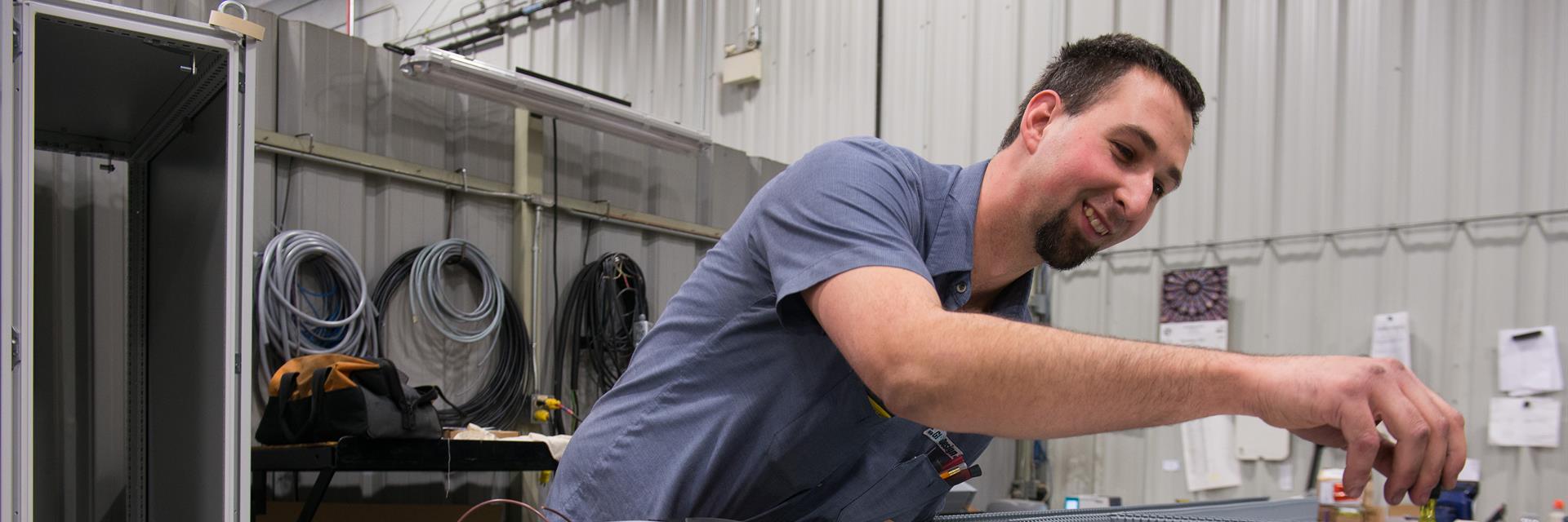 Young person working in a uniform.