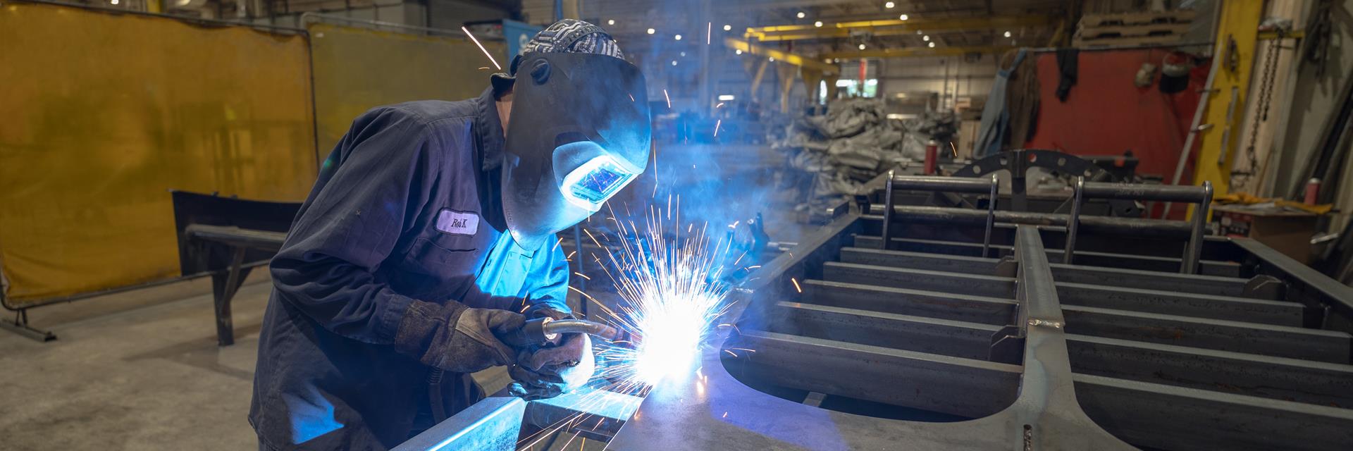 Close up of someone working with their hands.