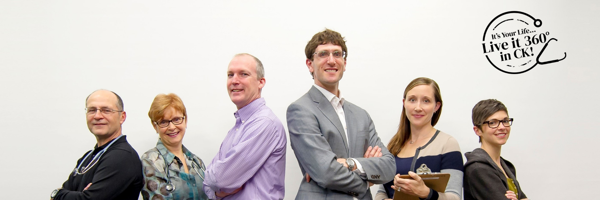 Group of physicians standing in a line and smiling at the camera, with the "Live it 360 degrees" logo overlaid on the top right.