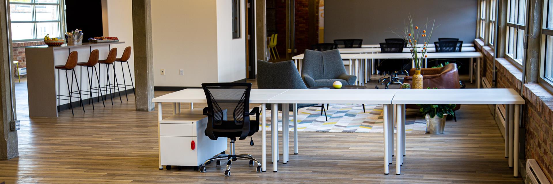 Co-working space with chairs and desks.