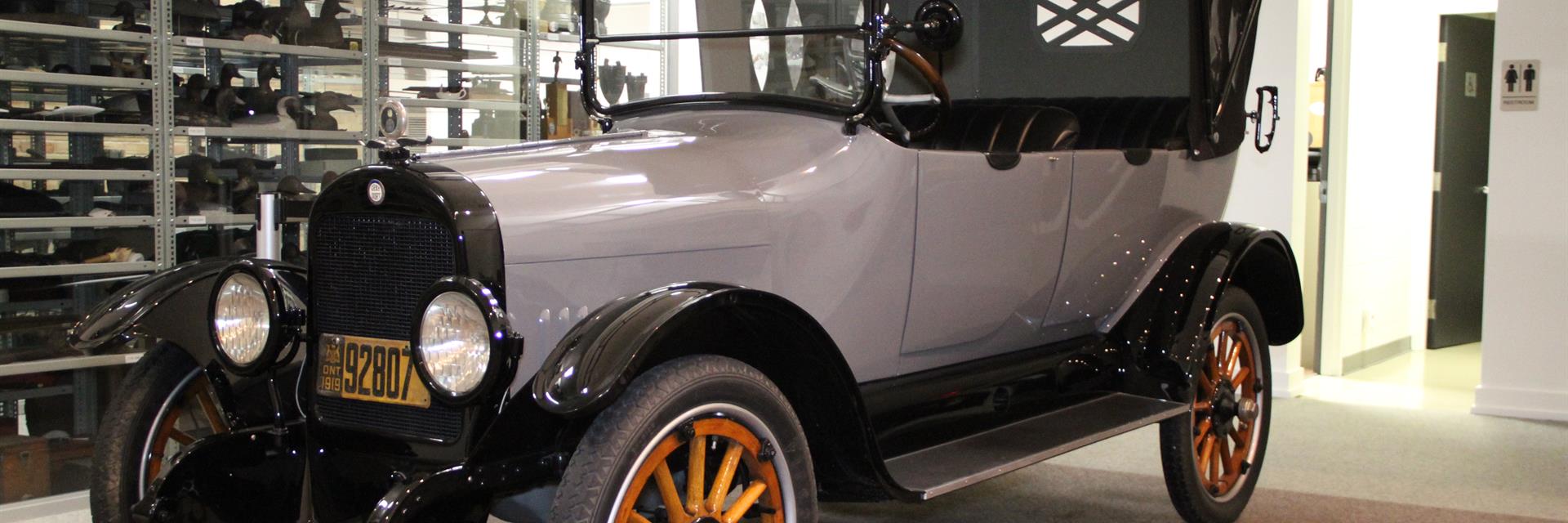 a gray-dort touring car on display at the chatham-kent museum