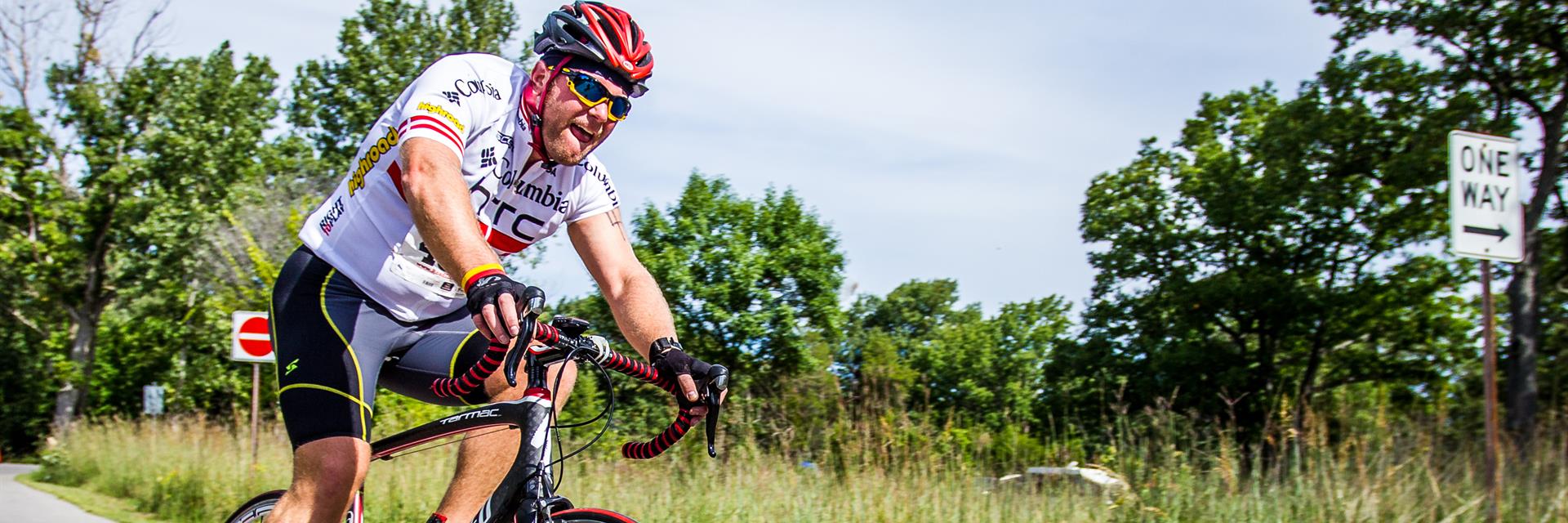 man cycling on a path in chatham-kent