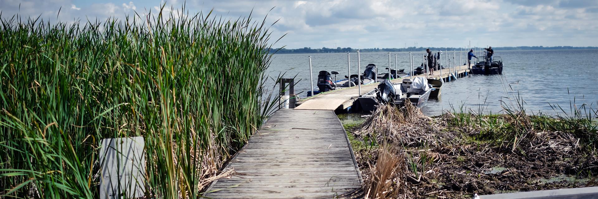 Dock with duck hunting boats 