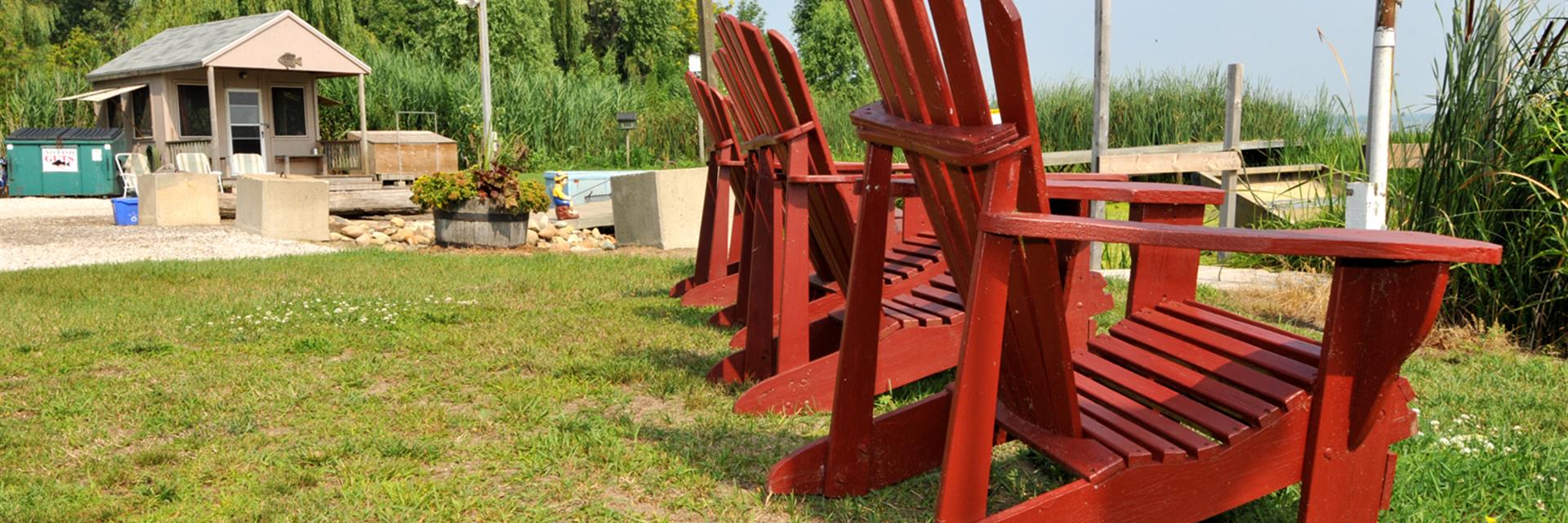lawn chairs facing the beach 