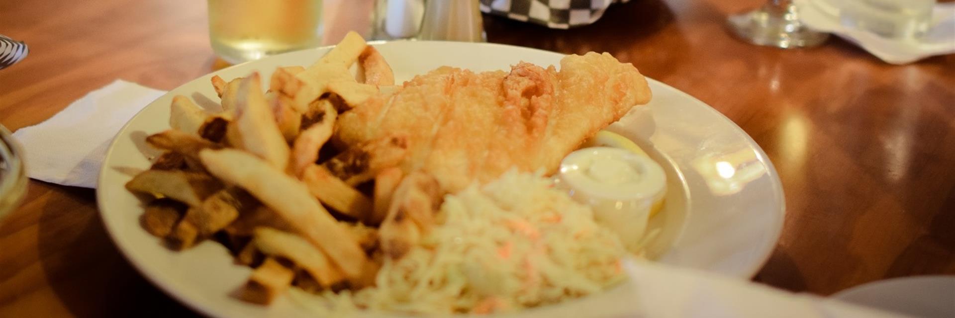 fish and chips dinner on a plate 