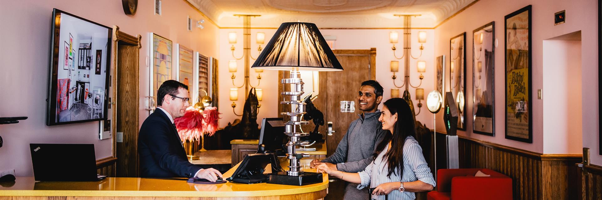 couple at hotel front desk